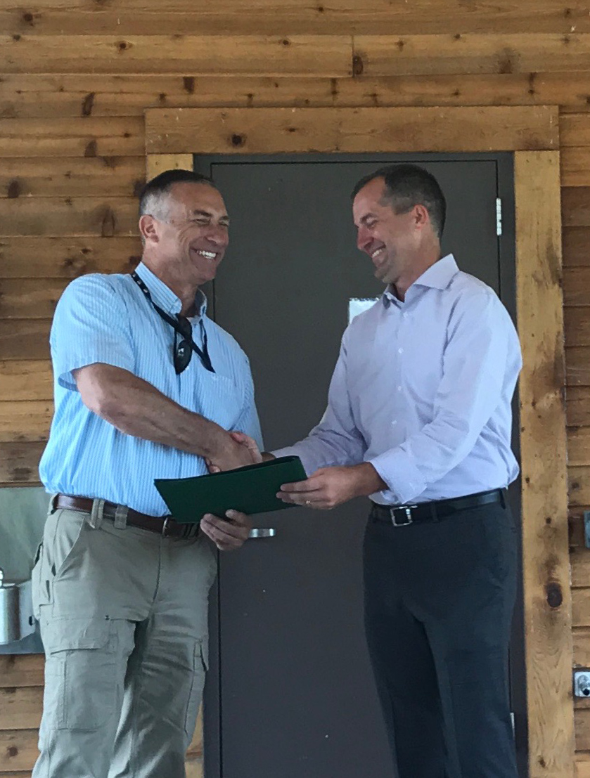Iowa Secretary of Agriculture Mike Naig presented an Ag Leader Award to Kurt Simon on July 9, 2020.
