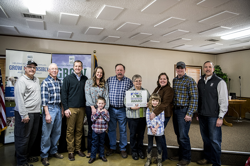 Oschel Family with Secretary Mike Naig, Bob Quinn from the BIG Show, and Brian Waddingham from the Coalition to Support Iowa's Farmers