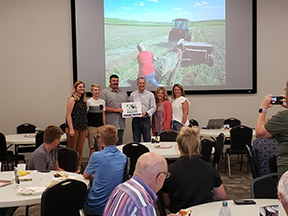 Weber family receiving the Wergin Good Farm Neighbor Award.